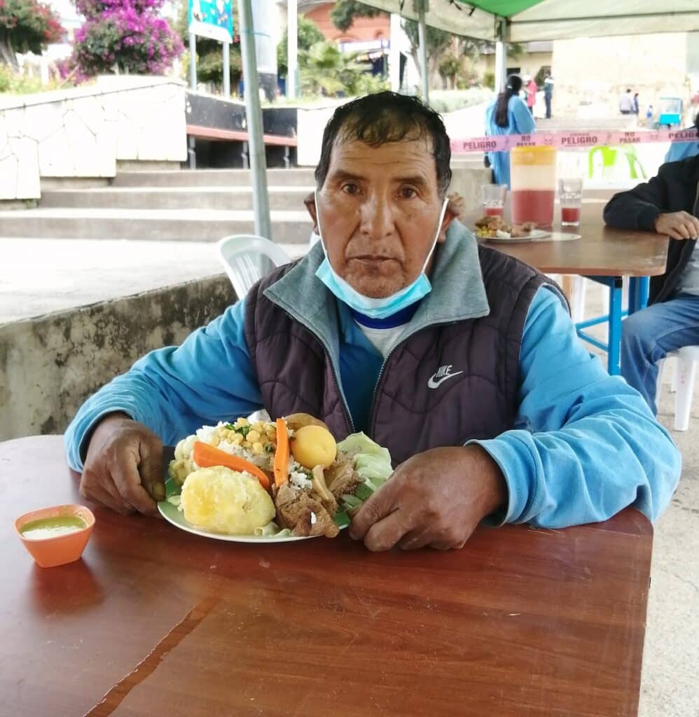 A man with a plate of food