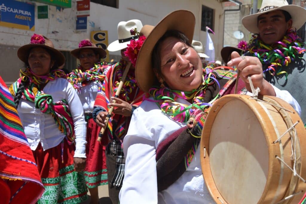 Woman playing a tinya